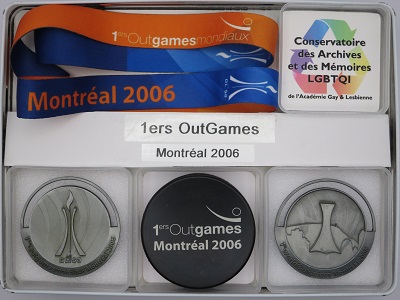 M&eacute;daille palet 1ers OutGames Montr&eacute;al 2006